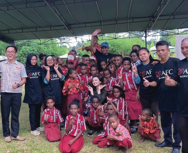 Program AFC Care di Nabire bersama Raline Shah